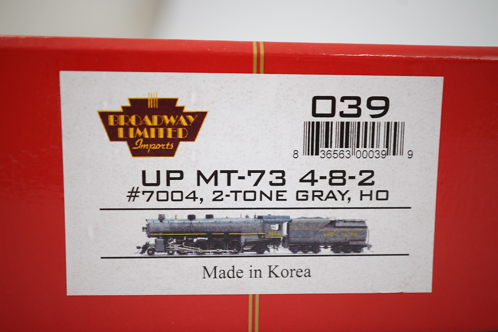 A boxed HO gauge Broadway Limited Paragon Series (039) model of Union Pacific MT-73, 7004, 4-8-2 locomotive with bogie tender, powered for two rail operation.